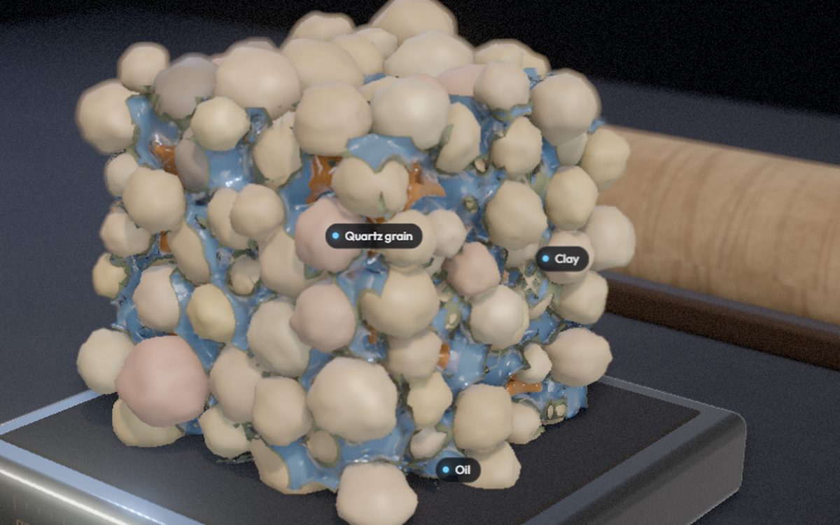 Pore Lab: a magnified cube of sandstone grains with water and oil in the pore space